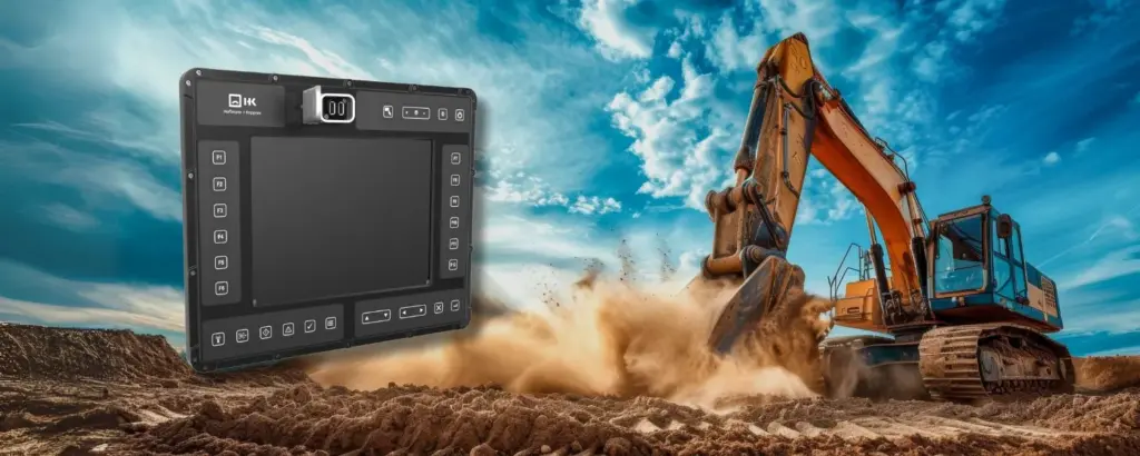 Robustes Touch-Display mit einem Bagger im Hintergrund